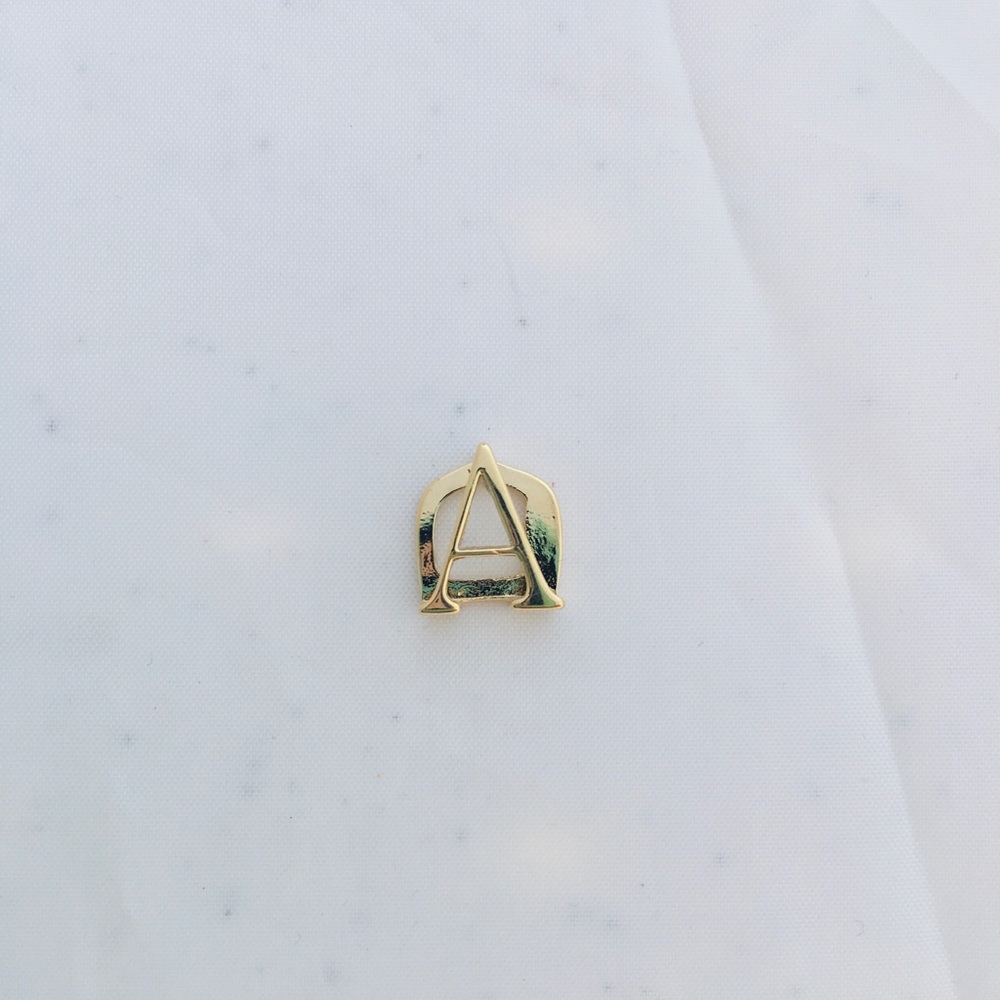 KEEP Collective Gold “Alpha” Charm.